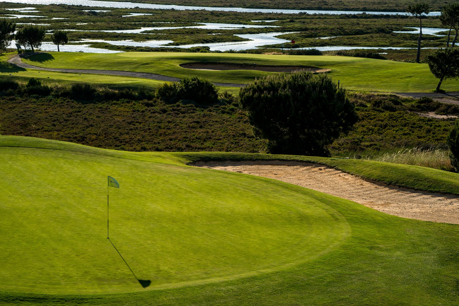 El Rompido golf green, overlooking the marshland channels